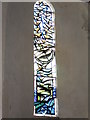 Stained glass window on the west wall at St Andrew, Tangmere