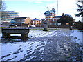 The water trough and milestone on the traffic island at Shirehall