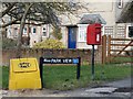 Post box by the sign