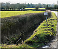 Roadside signage and Collins Lane, Purton