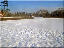 SO8047 : Lying snow near Rectory Road by Trevor Rickard