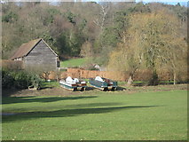 TQ5337 : Beached boats, Groombridge House by David Anstiss