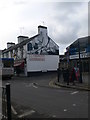 Mural on the gable end of J T Thomas, Butcher