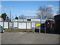 Sign and posters at Aylesford Railway Station