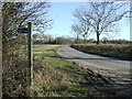 Footpath Sign And Road