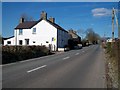 Houses alongside the B4411 Criccieth road at Rhoslan