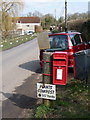 ST8313 : Child Okeford: postbox № DT11 127, Shaftesbury Road by Chris Downer