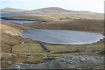 HU5144 : The Loch of Aithness with some of the old slate quarries spoil by john bateson