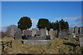 SN5970 : Llangwyryfon graveyard by Nigel Brown