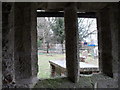 Looking from the church porch into the churchyard at Wiggonholt