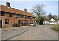 TL9992 : Terraced cottages in North End - Snetterton by Evelyn Simak