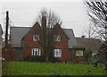 Former farm cottages and The Green - Stratton