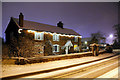 Farm on a snowy night