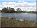 Flooded quarry workings-now a private fishing club