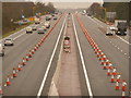 SU7955 : Fleet: cones and rain on the M3 by Chris Downer