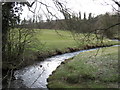 Stream at Combs flowing under the railway into the reservoir