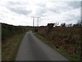 Power lines crossing the Llangybi-Ynys road near Pencoed-fawr