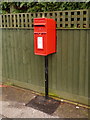 SY9995 : Broadstone: postbox № BH18 210, Lytchett Drive by Chris Downer
