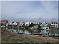 TQ1904 : Houses beside Widewater lagoon by Paul Gillett