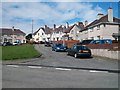 Houses arranged around a green in Cefn Hendre