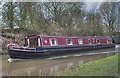 Narrowboat cruising along the Coventry canal