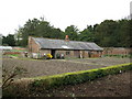 SU8477 : Potting sheds in the walled garden at Shottesbrooke Park by don cload