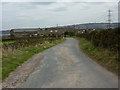 Scholes Lane as it approaches Scholes Farm from the west