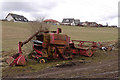 Abandoned combine harvester