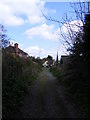 TM3977 : Path to the B1123 Holton Road by Geographer