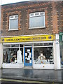 TQ1804 : Charity shop in Station Parade, Lancing by Basher Eyre