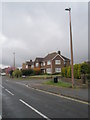 TQ1804 : Approaching the junction of Station Approach and Rosecroft Close by Basher Eyre