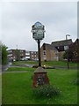 Village signpost in Bustice Lane