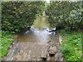 Spillway from pond near Huggetts Farm