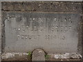 A plaque on the downstream side of Umberleigh Bridge on the River Taw