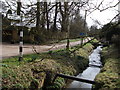 Stream and signpost, Winwick