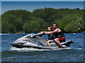 SP2095 : Guy and young lad on a Jet Ski by John Carver