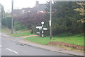 Road signpost, Church St