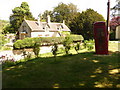 Minterne Magna: phone box and cottage