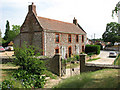 Flint and brick cottages in Feltwell