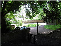 ST7611 : All Saints, Fifehead Neville- looking from the churchyard into the car park by Basher Eyre