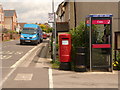 Chickerell: postbox № DT3 64 and phone, East Street