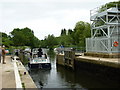 A pleasure boat leaves the lock at East Farleigh