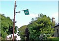 The green flag of the Irish Football Association - Northern Ireland  hanging above Manse Road