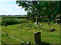 Graves in the churchyard, the Parish Church of St John the Baptist, Bodicote