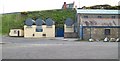 Fuel tanks and the Old Lifeboat Station at Kilkeel