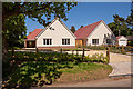 Two newly-built bungalows at bottom of Hill Lane