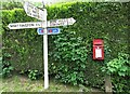 Postbox and Road sign in Hindford