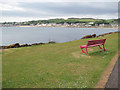 Red bench above the shore