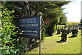 Church sign and graveyard