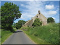 A row of old farm buildings